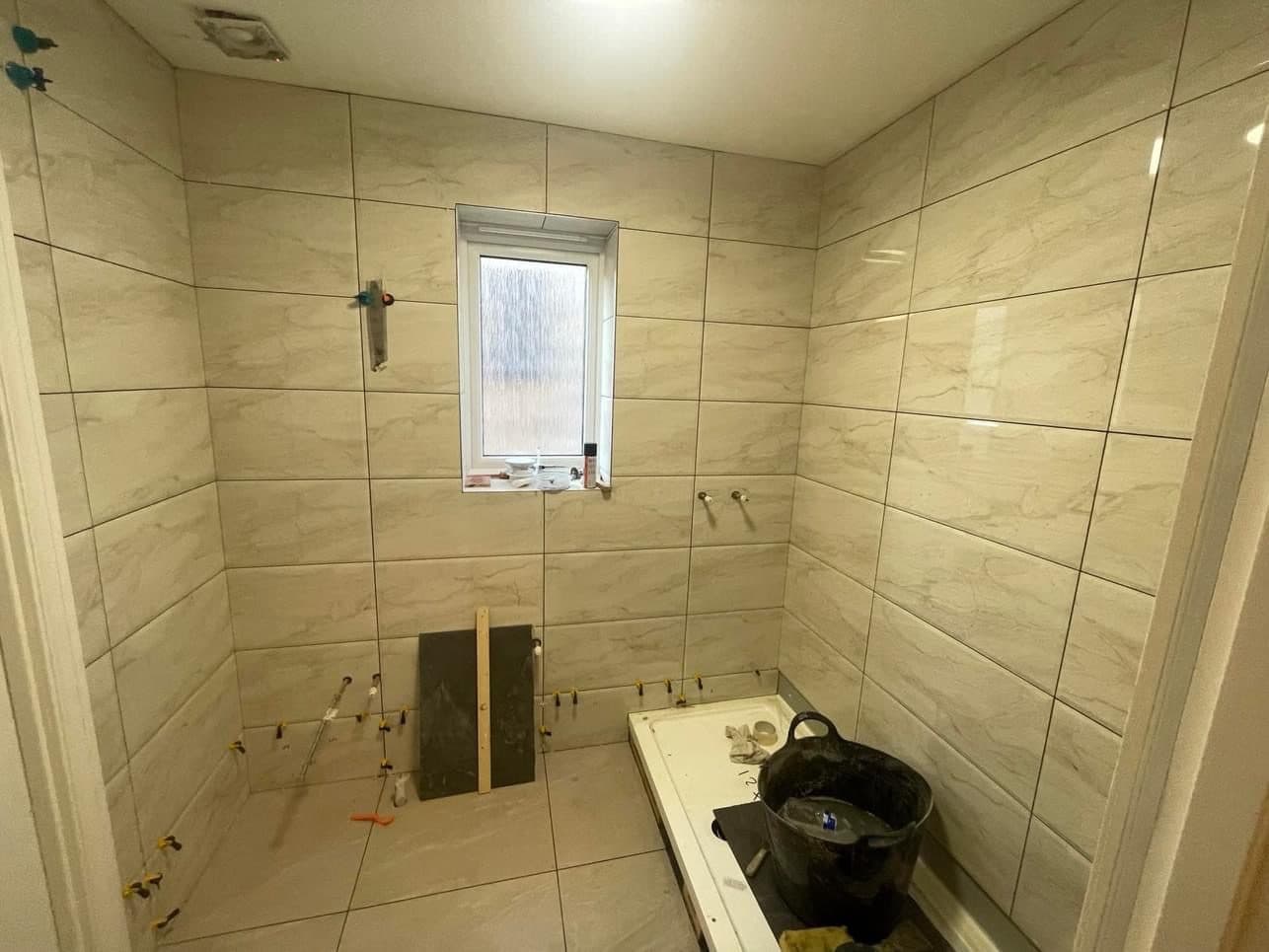 B5 — Bathroom wall tiling, construction progress