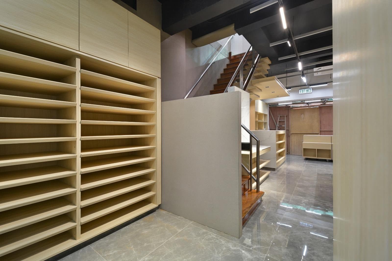 Tai Cheong Calendar Shop — entrance and stair overview, completed showcase