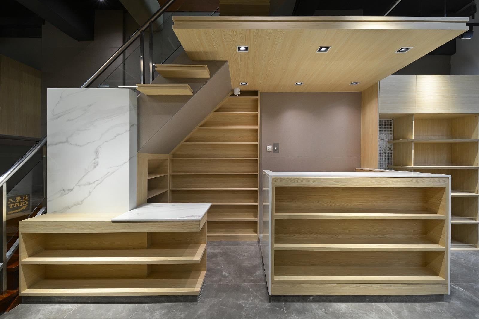 Tai Cheong Calendar Shop — stair display zone, completed showcase