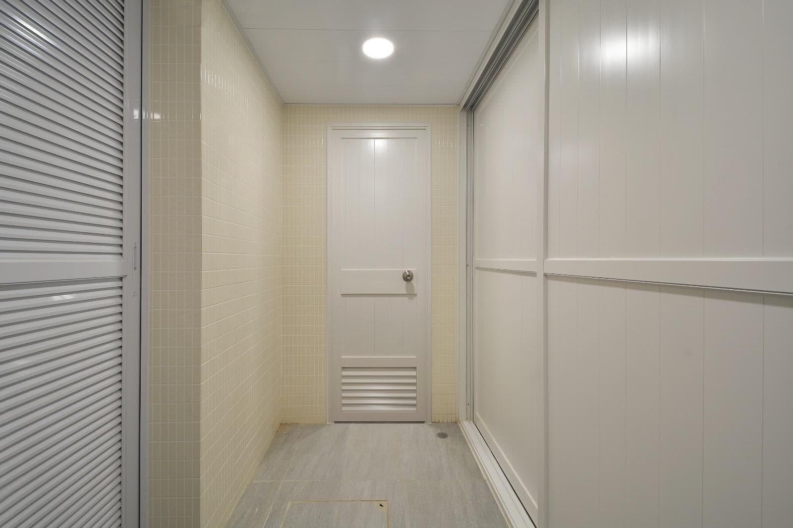 Tai Cheong Calendar Shop — staff corridor joinery, details