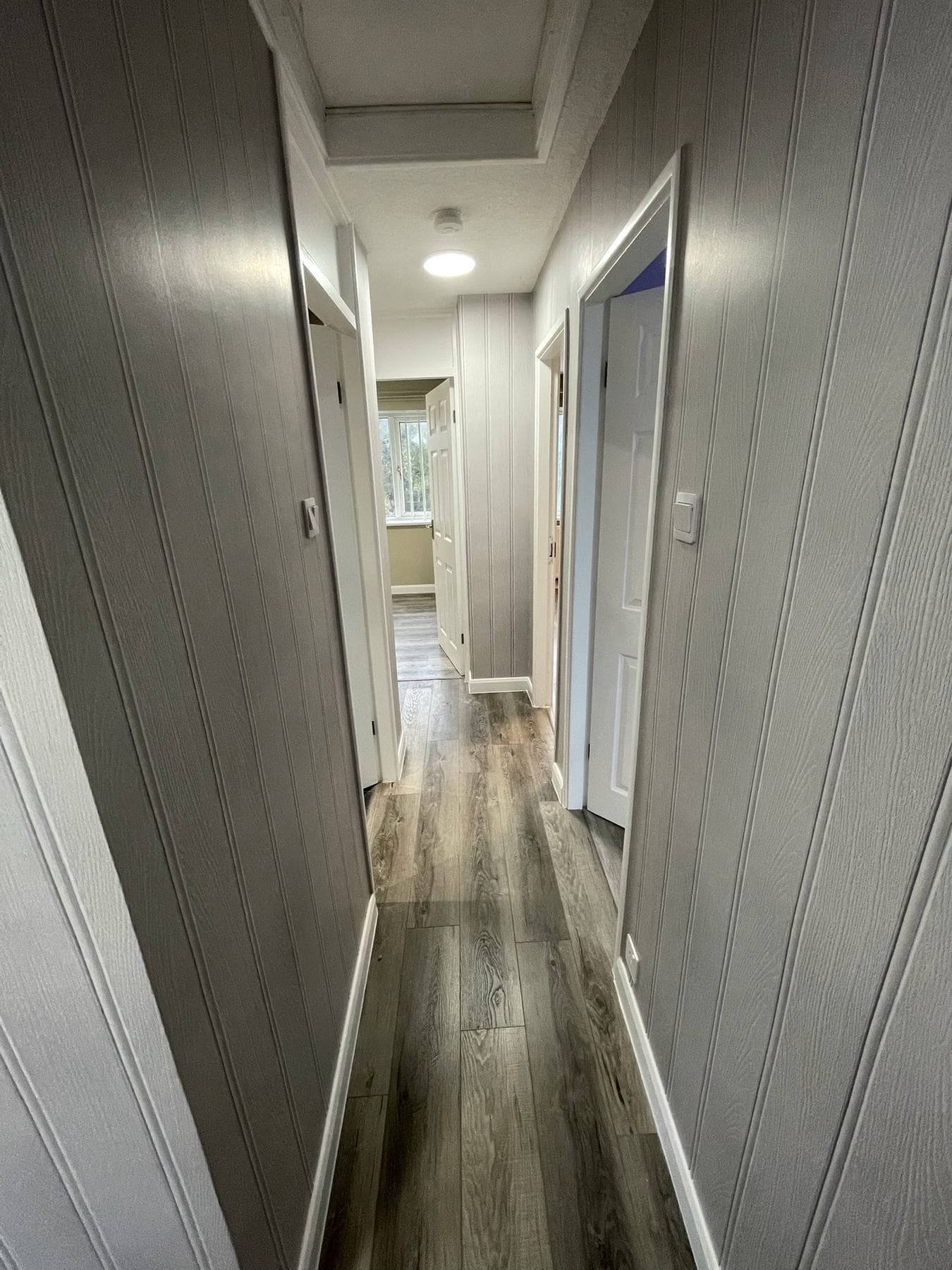 B36 — Ground-floor hallway, completed showcase