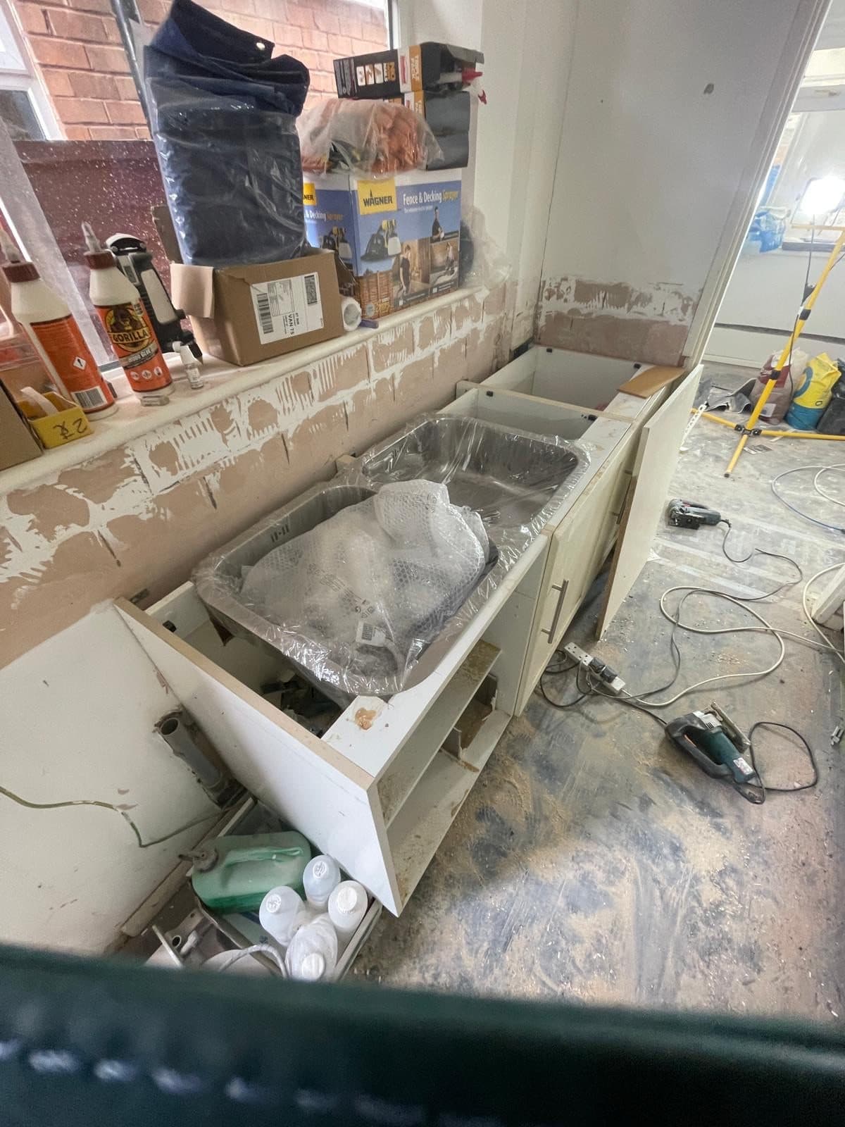 B36 — Kitchen unit installation, construction progress