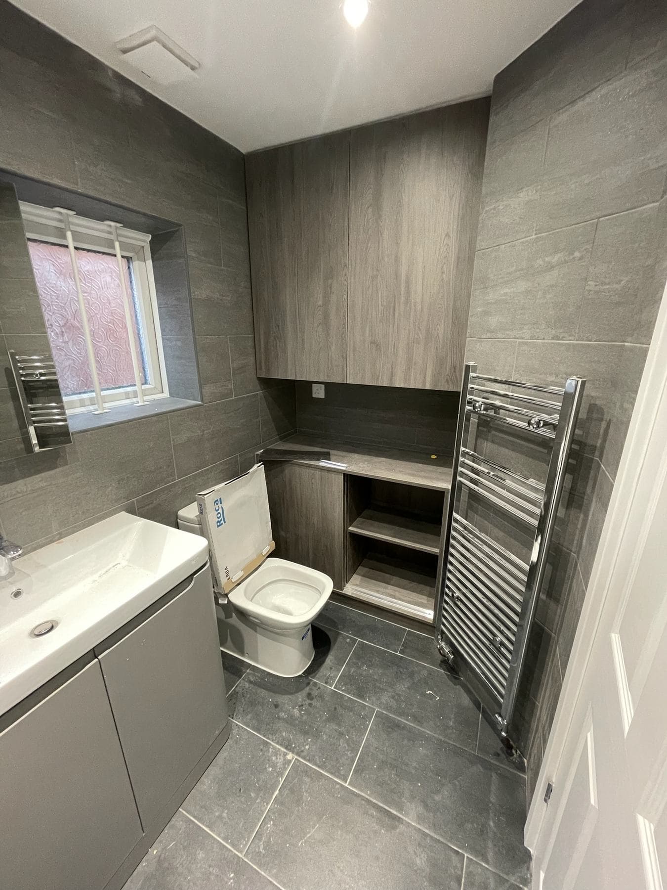 B36 — Bathroom storage wall, construction progress