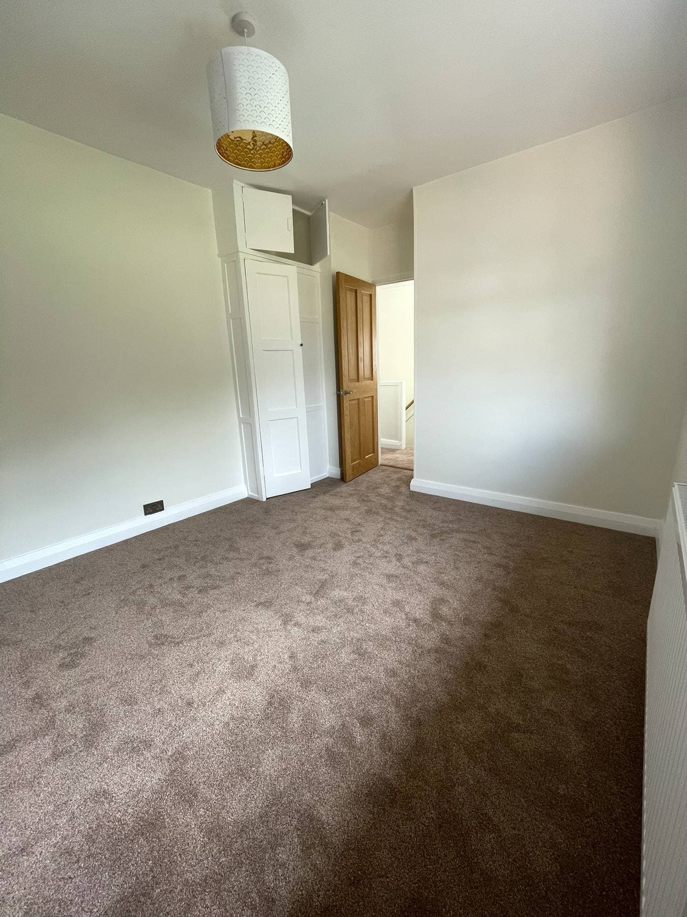B75 — Bedroom with built-in storage, completed showcase