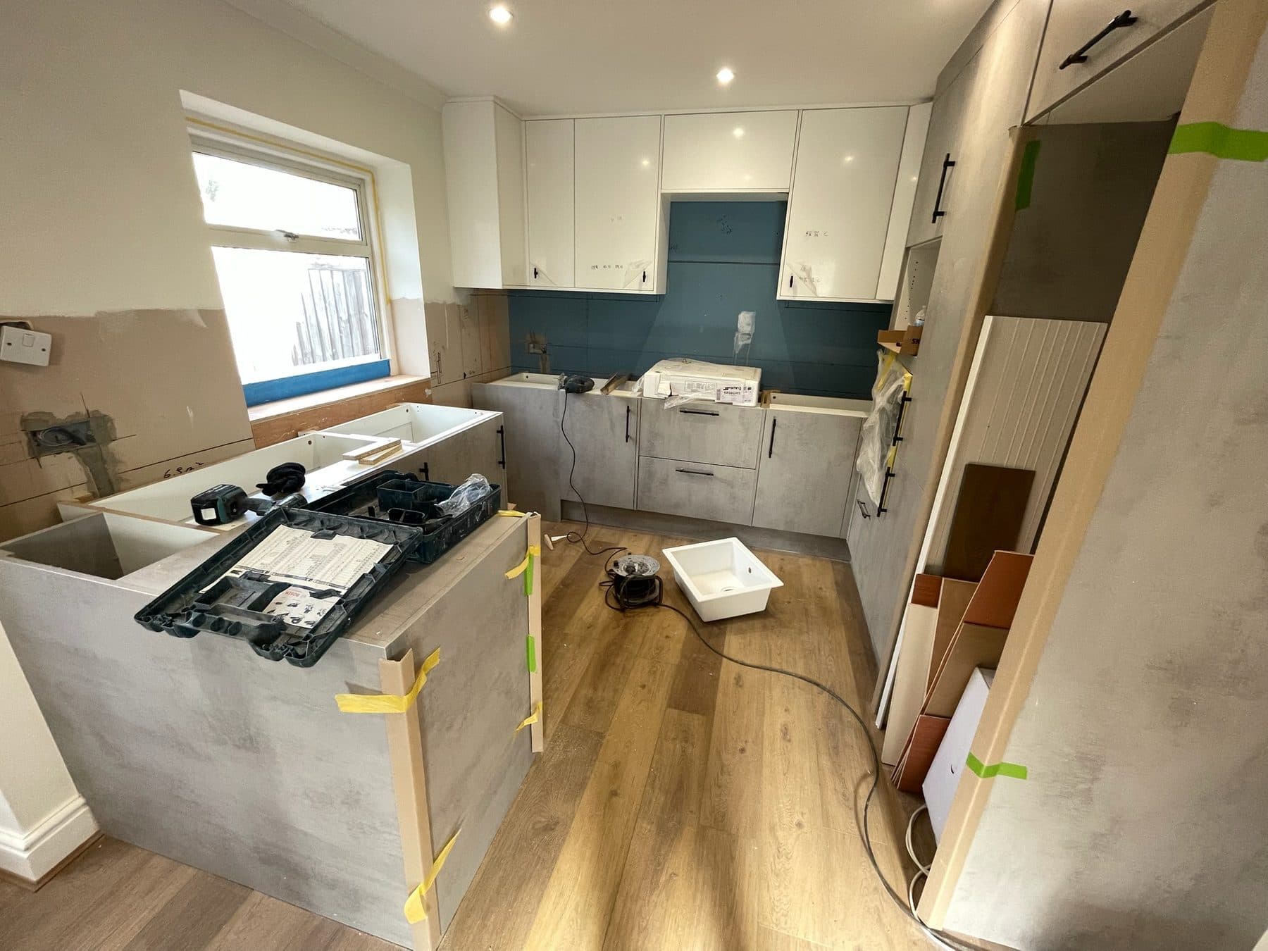 B75 — Kitchen unit installation, construction progress