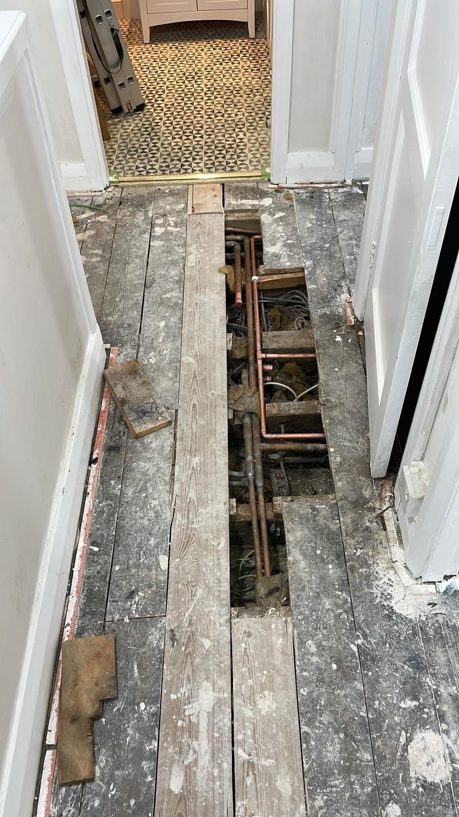 B75 — Hallway floor and services, construction progress