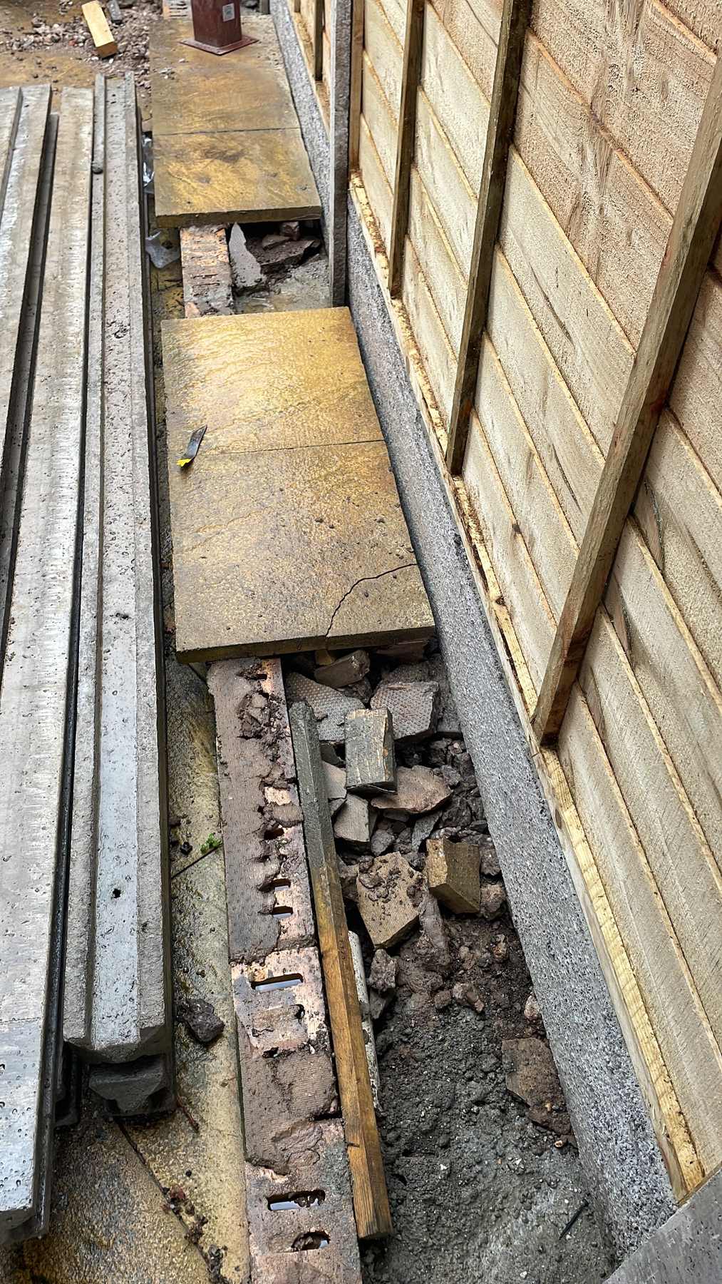 B76 — Fence base and paving, construction progress